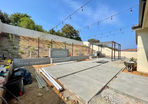 backyard-design-in-progress-with-cement-market-lights-fountain-and-gazebo_t20_A33OVP